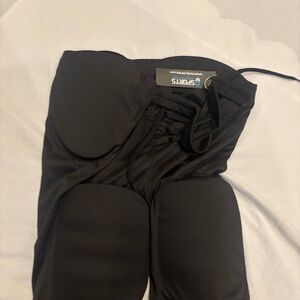 Black double knit integrated football pant youth large.